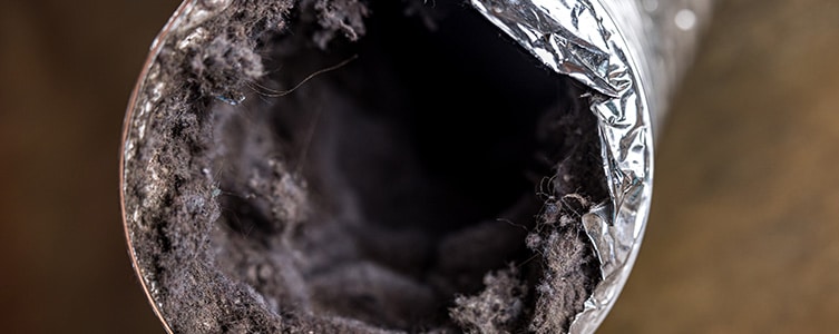 Dryer vent filled with lint